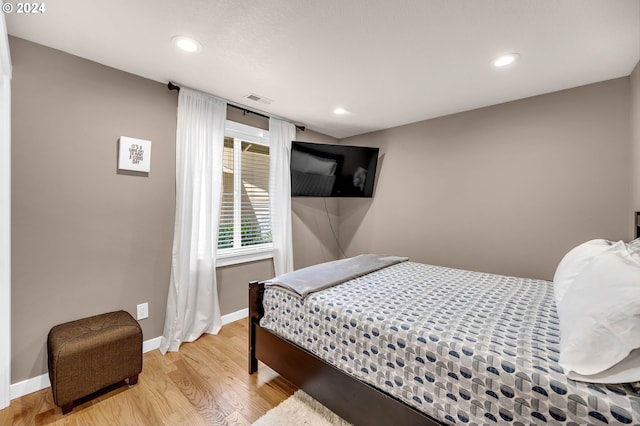 bedroom featuring light hardwood / wood-style floors