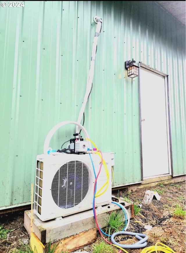 exterior details featuring ac unit