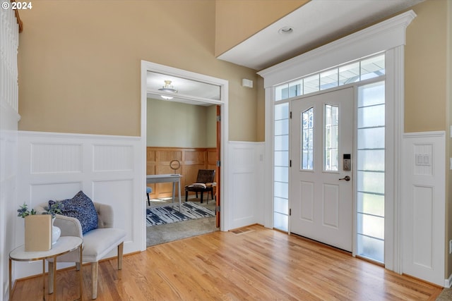 entrance foyer with light hardwood / wood-style flooring