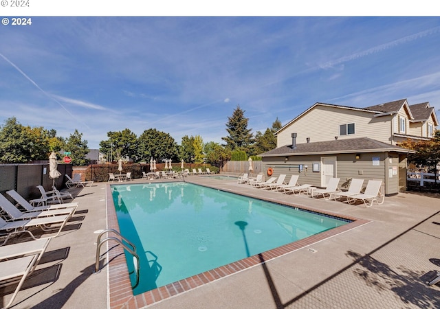 view of swimming pool featuring a patio