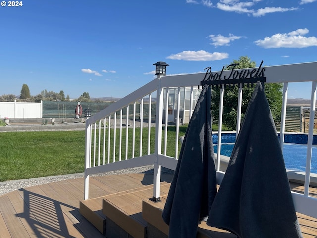 view of play area with a yard and fence