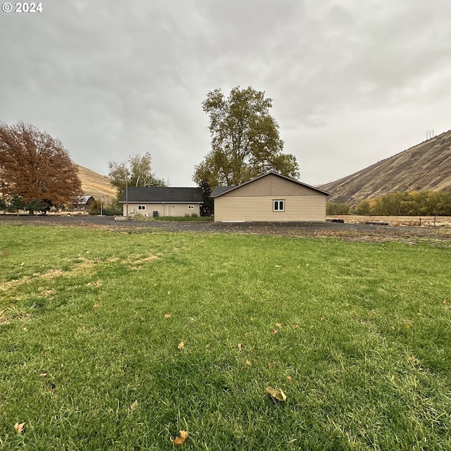 81890 S Fork Walla Walla Riv Rd, Milton-Freewater, OR 97862 - view of property exterior featuring a lawn and a mountain view