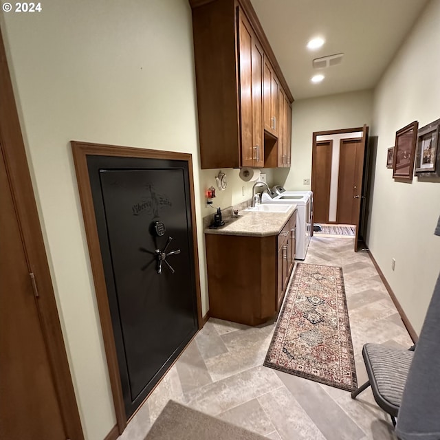 81890 S Fork Walla Walla Riv Rd, Milton-Freewater, OR 97862 - kitchen with light countertops, washing machine and dryer, recessed lighting, and baseboards