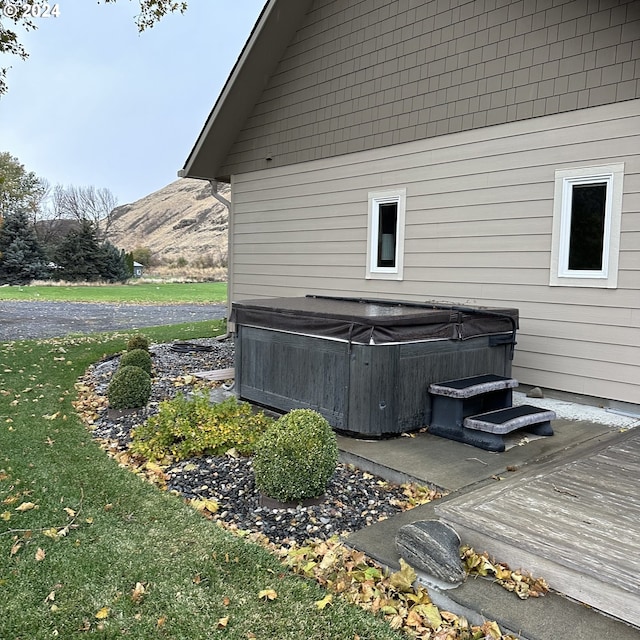 81890 S Fork Walla Walla Riv Rd, Milton-Freewater, OR 97862 - wooden terrace featuring a hot tub, a mountain view, and a yard