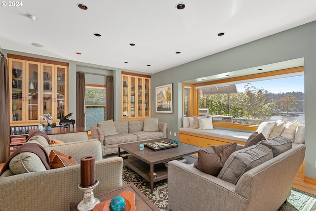 living room featuring hardwood / wood-style flooring and a wealth of natural light