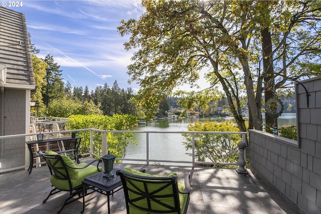 view of patio / terrace with a water view