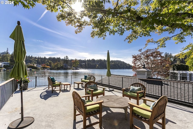 view of patio featuring a water view