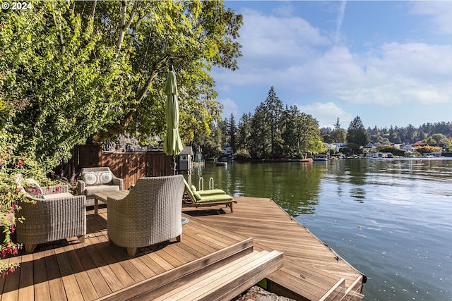 dock area featuring a water view