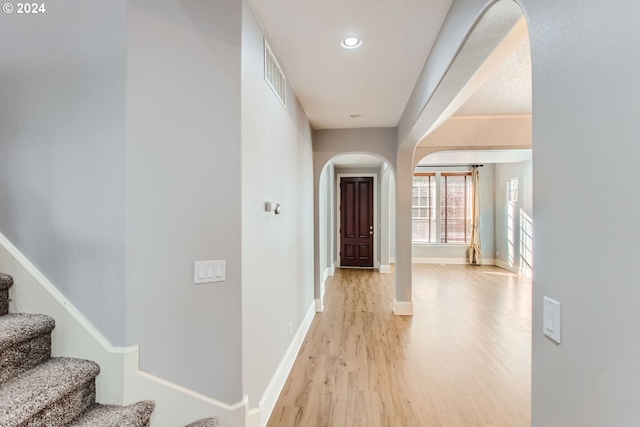 corridor featuring light wood-type flooring