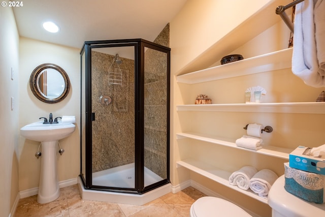 bathroom featuring walk in shower and toilet