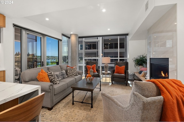 590 Waterfront Way Unit 202, Vancouver, WA 98660 - living room with recessed lighting, a premium fireplace, and visible vents