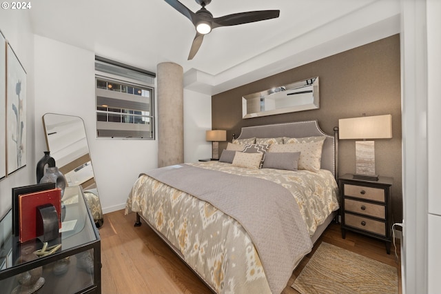 590 Waterfront Way Unit 202, Vancouver, WA 98660 - bedroom featuring baseboards, wood finished floors, and ceiling fan