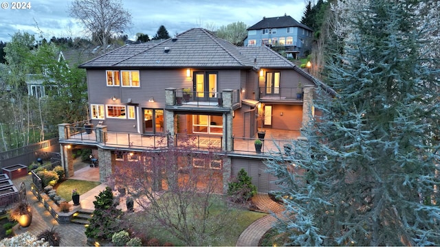 rear view of house with a balcony