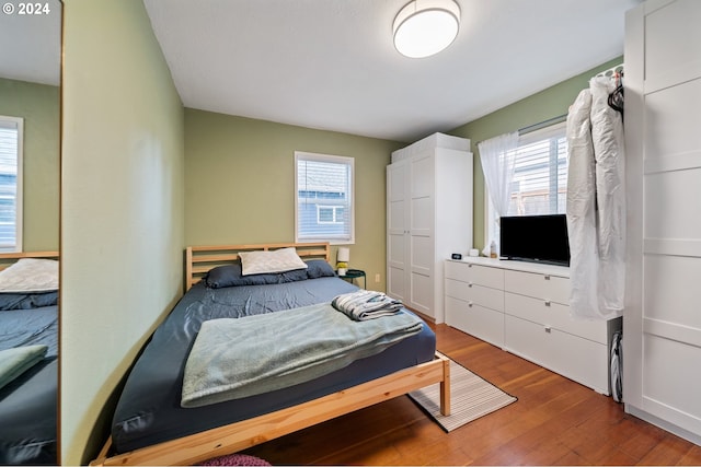 bedroom featuring hardwood / wood-style floors