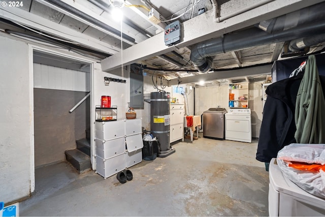 basement featuring separate washer and dryer and water heater