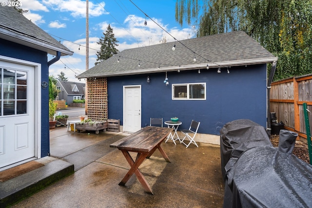 back of house with a patio area