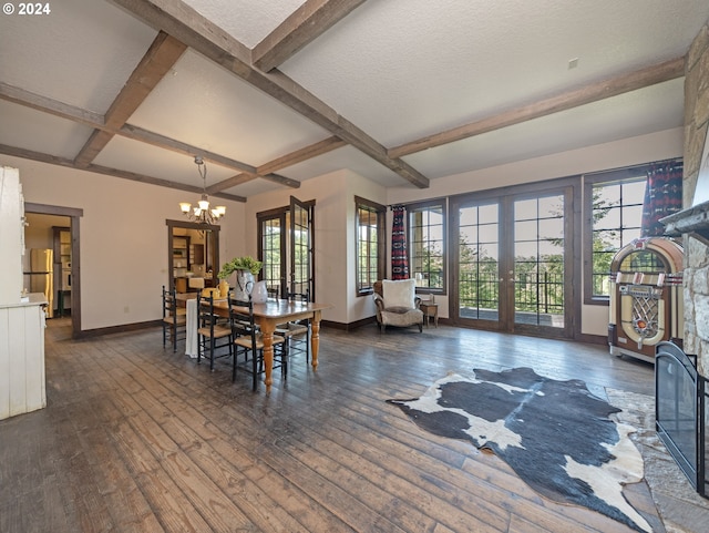 dining area featuring beam ceiling, a notable chandelier, dark hardwood / wood-style flooring, and coffered ceiling