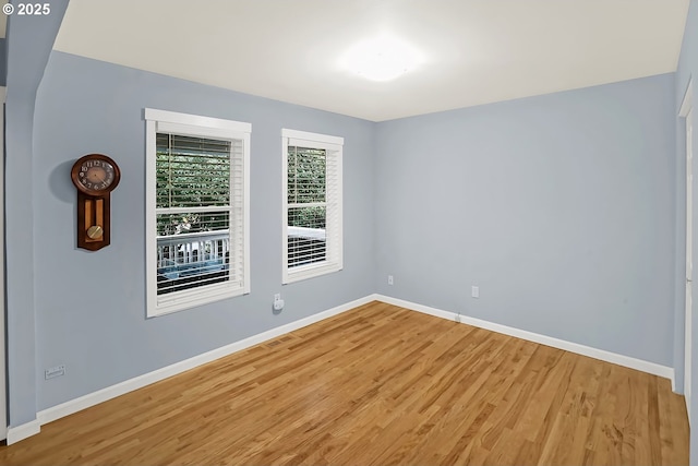 empty room featuring hardwood / wood-style flooring