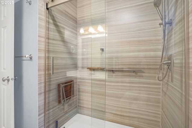 bathroom featuring an enclosed shower