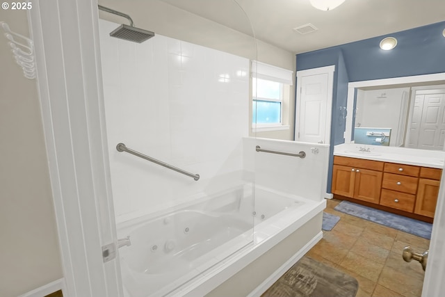 bathroom featuring vanity, shower / bath combination, and tile patterned floors