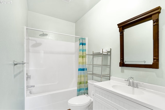 full bathroom featuring shower / bath combo, vanity, and toilet