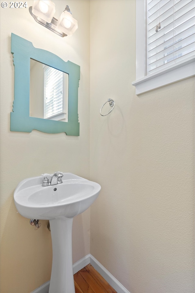 bathroom featuring hardwood / wood-style floors and sink