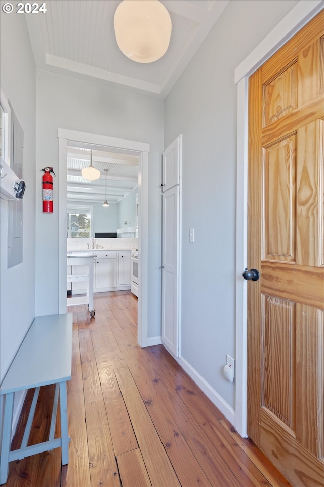 corridor featuring light hardwood / wood-style flooring