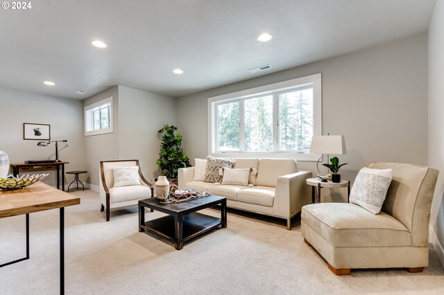 living room with light carpet