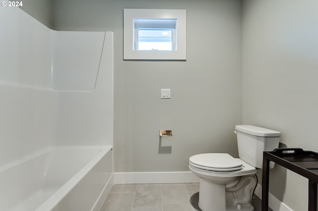 bathroom featuring tile patterned floors and toilet