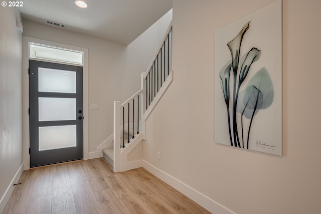 foyer entrance featuring light hardwood / wood-style floors