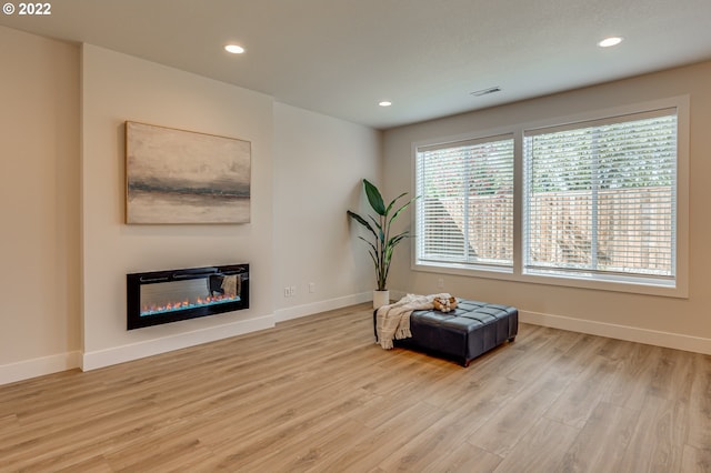 living area featuring light hardwood / wood-style flooring