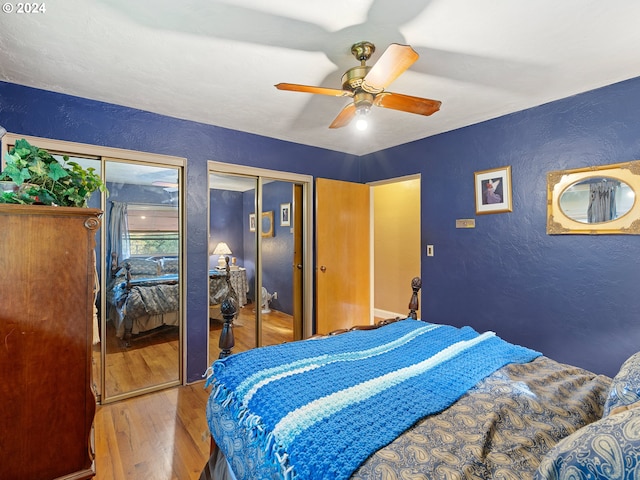 bedroom with hardwood / wood-style flooring and ceiling fan