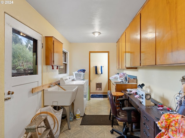 interior space with separate washer and dryer, plenty of natural light, and sink