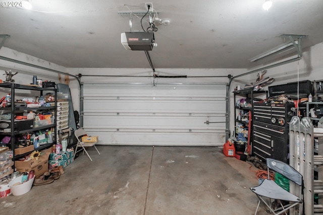 garage featuring a garage door opener