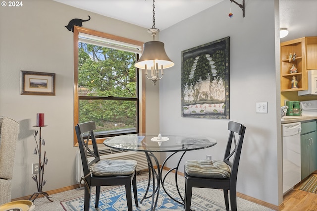 dining room with light wood-type flooring