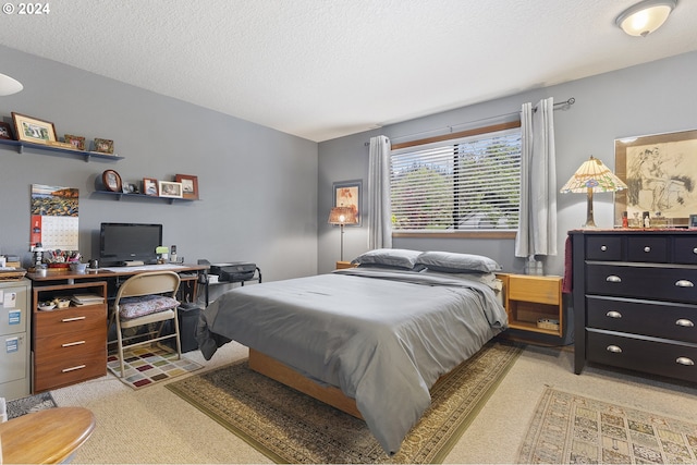 bedroom featuring a textured ceiling