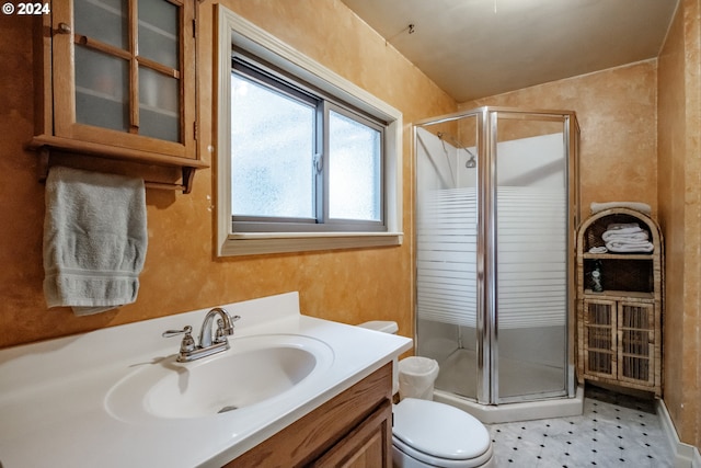 bathroom with vanity, walk in shower, vaulted ceiling, toilet, and tile patterned flooring