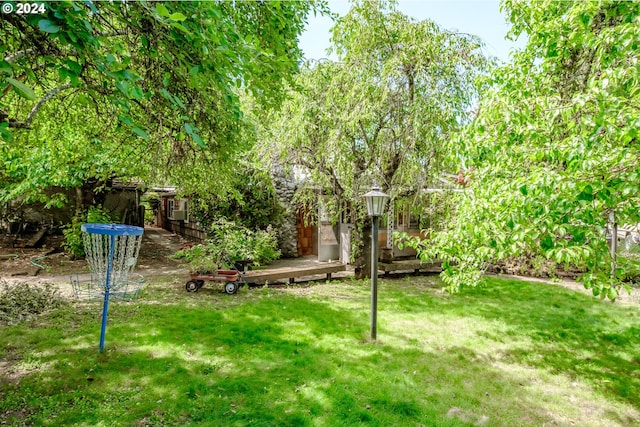 view of yard with a deck