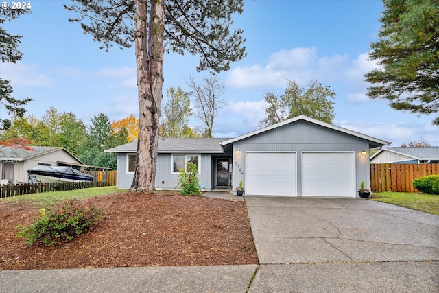 single story home featuring a garage