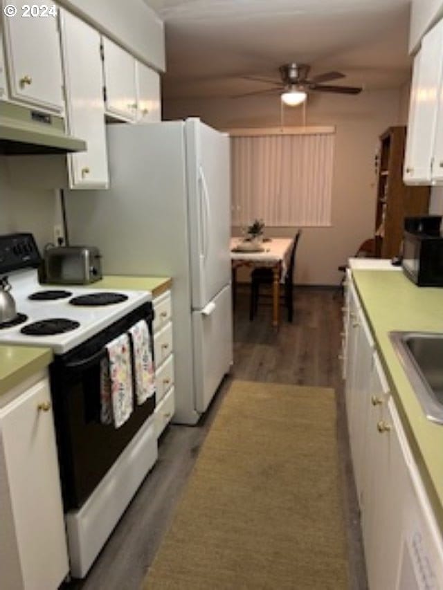 kitchen with white cabinets, white electric range oven, ceiling fan, and dark wood-type flooring