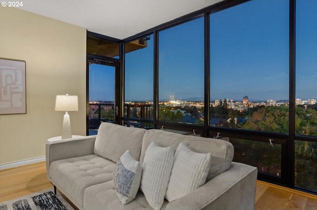 interior space featuring hardwood / wood-style flooring and expansive windows