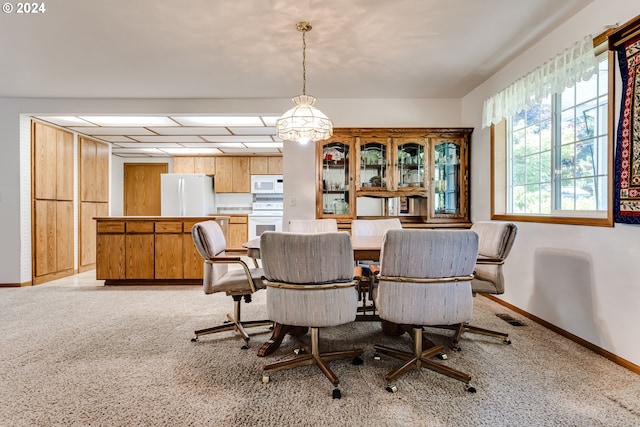 39431 Walterville Ln, Springfield, OR 97478 - dining room featuring baseboards and light carpet