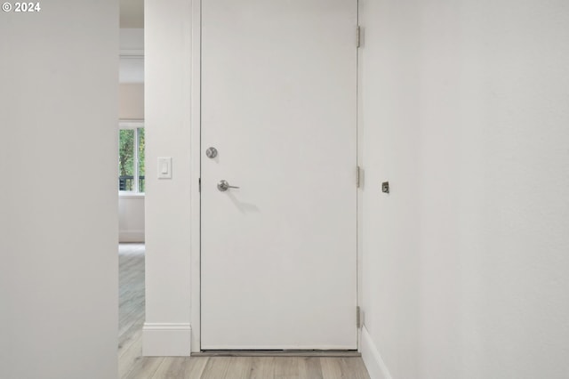 hall featuring light hardwood / wood-style floors