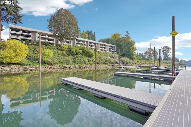 dock area featuring a water view