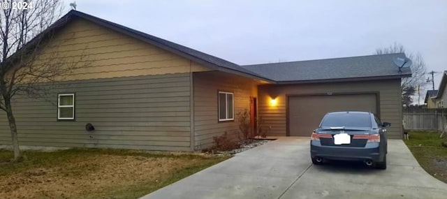 view of property exterior with a garage