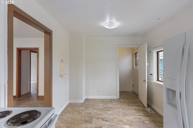 interior space featuring visible vents and baseboards