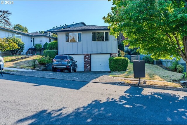 view of front of property with a garage