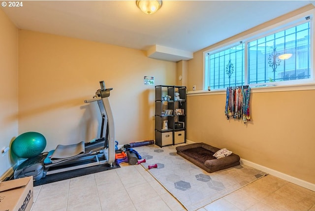 exercise area with tile patterned flooring