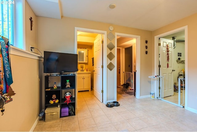 interior space with light tile patterned floors