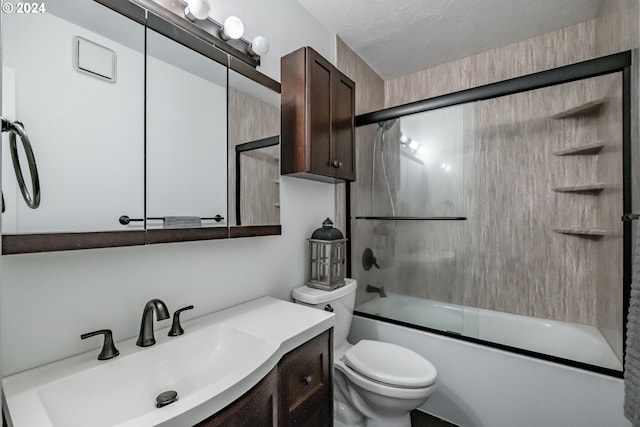 full bathroom featuring vanity, toilet, and enclosed tub / shower combo